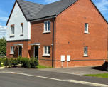 Photo of two new semi-detached houses