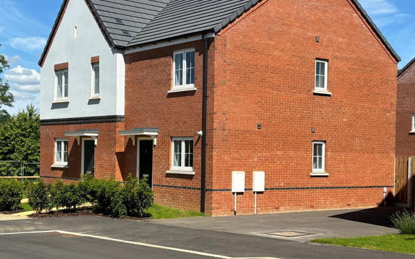 Photo of two new semi-detached houses