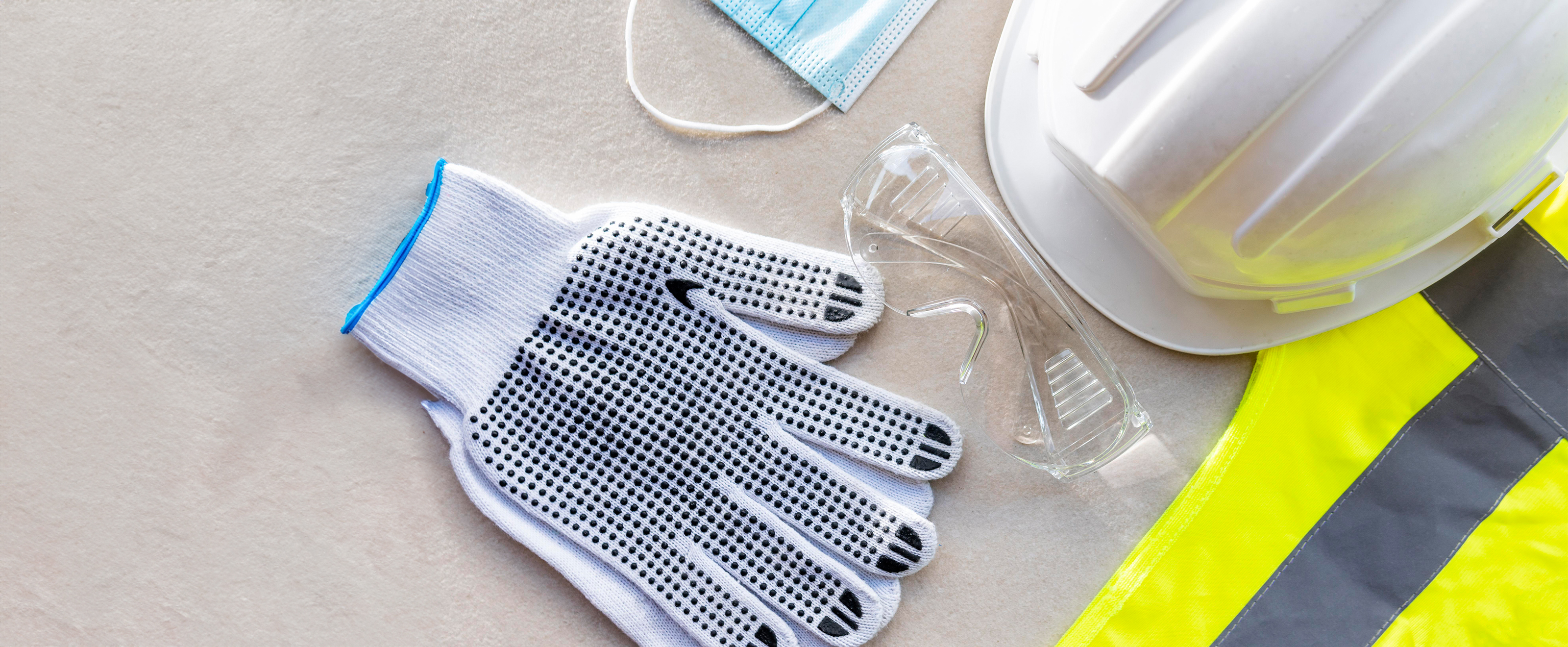 close up photo of several pieces of PPE arranged on a tabletop