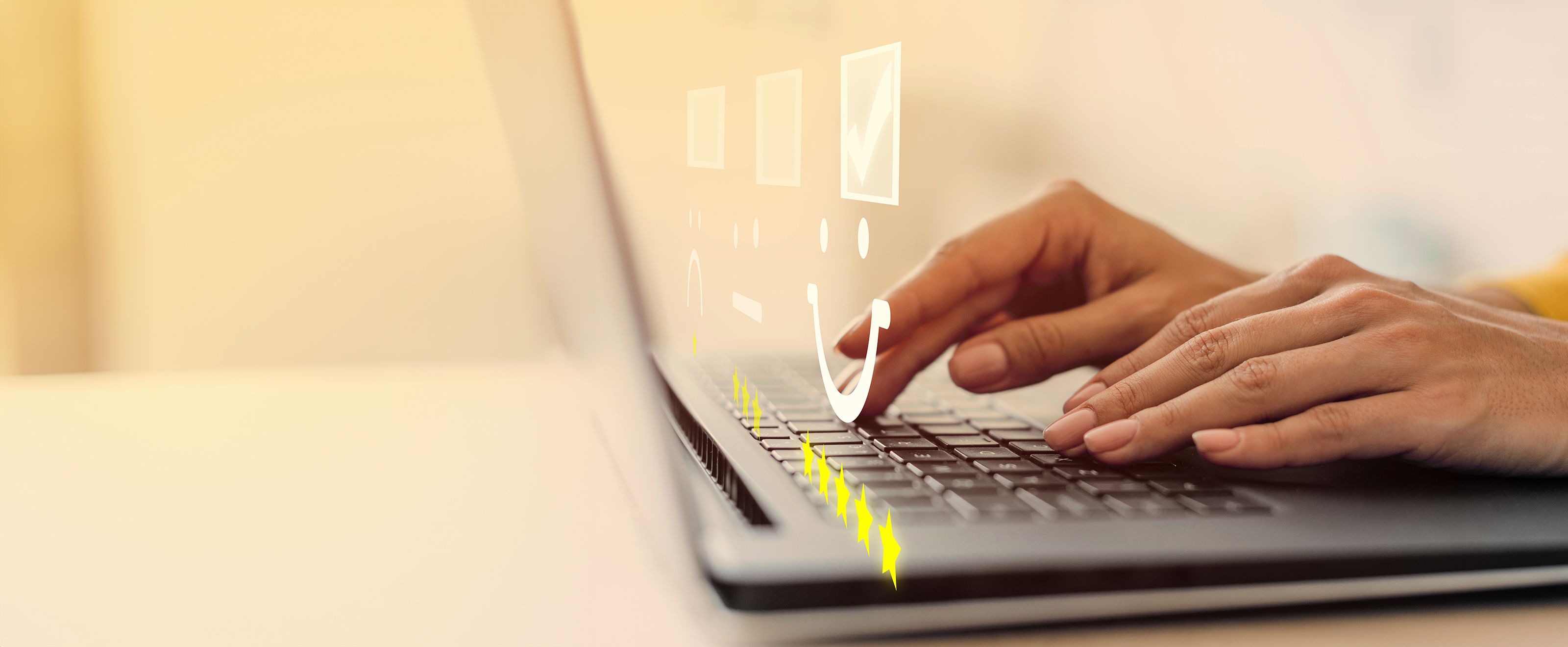 close up photo of someone using a laptop on a desk. Graphics of tick boxes and smiley and non-smiley faces have been overlaid